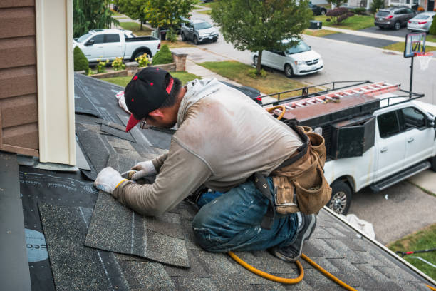 Professional Metal Roofing technician working in Mackinaw City, MI